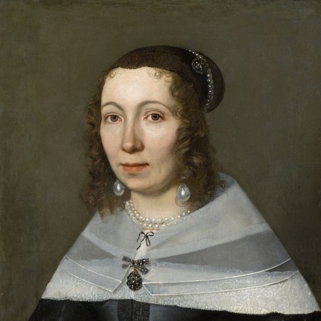 17th century woman in black dress, white collar, and pearl jewelry