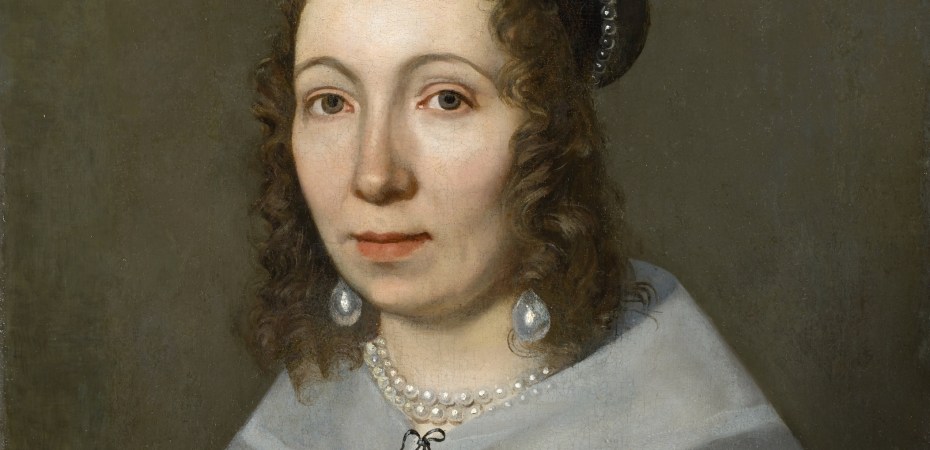 17th century woman in black dress, white collar, and pearl jewelry