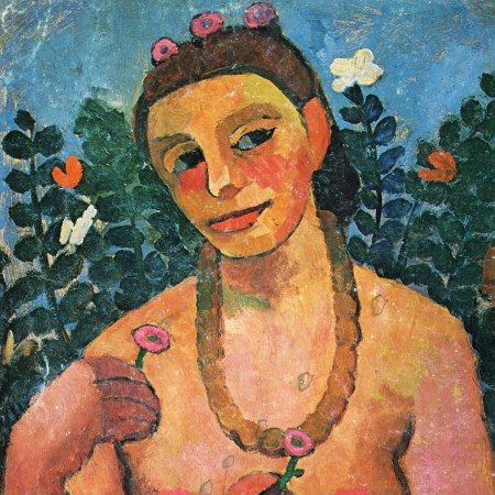 Woman with necklace holding flowers