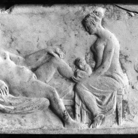 Roman relief of mother lounging while midwife holds newborn