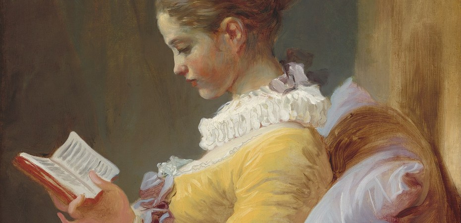 Girl in yellow dress reading a book
