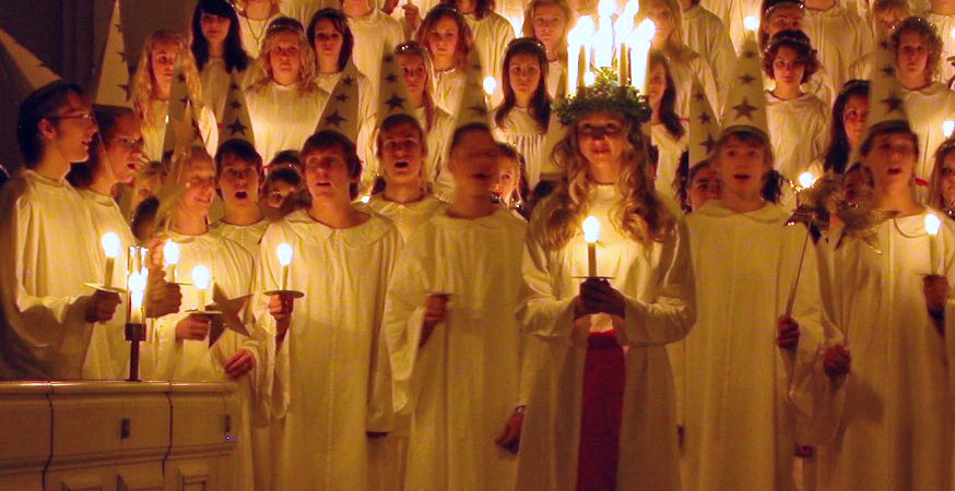 Choir in robes with candles